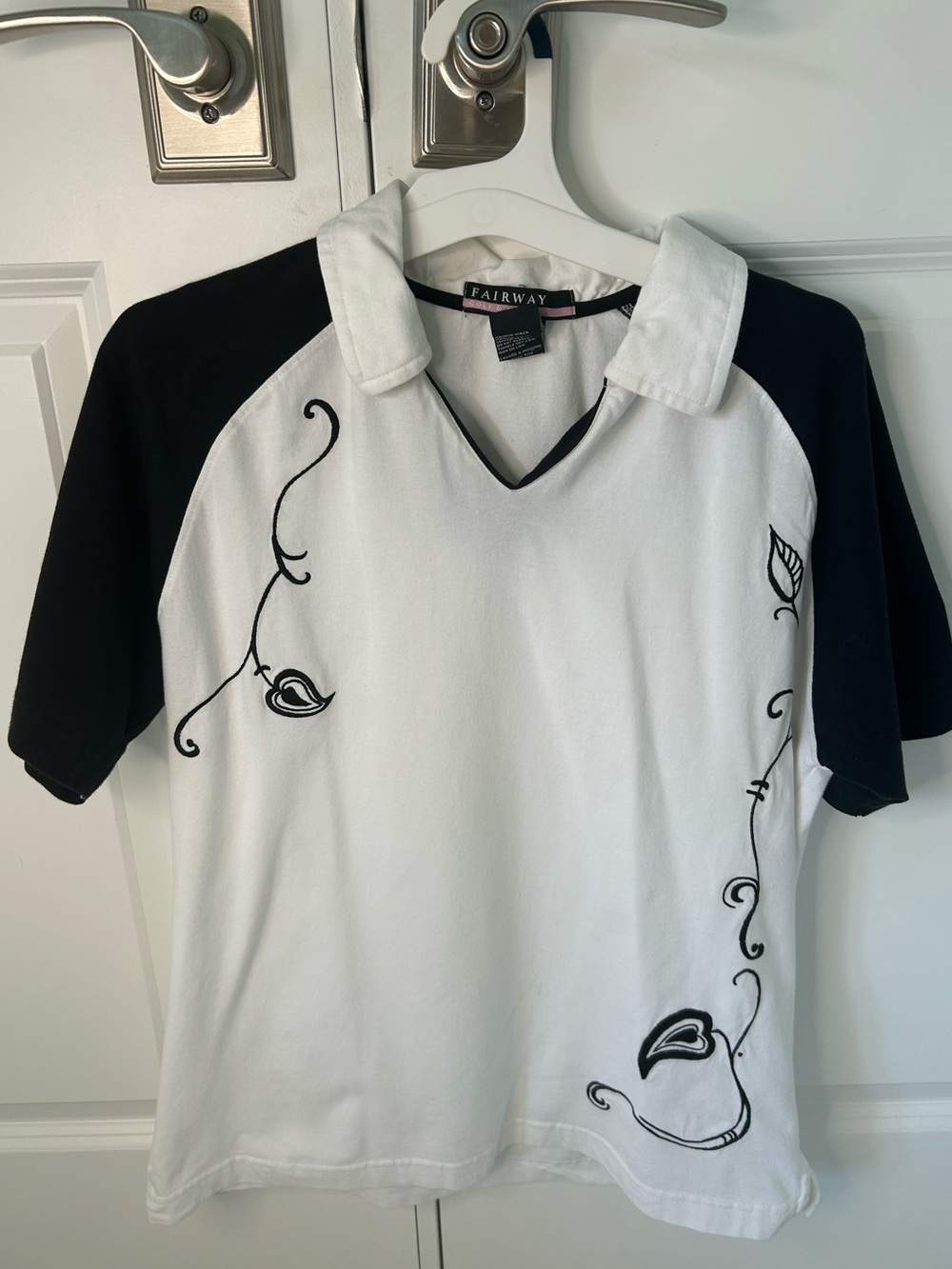 Women’s medium Black & White Collared golf Shirt with Embroidered Vine Detail